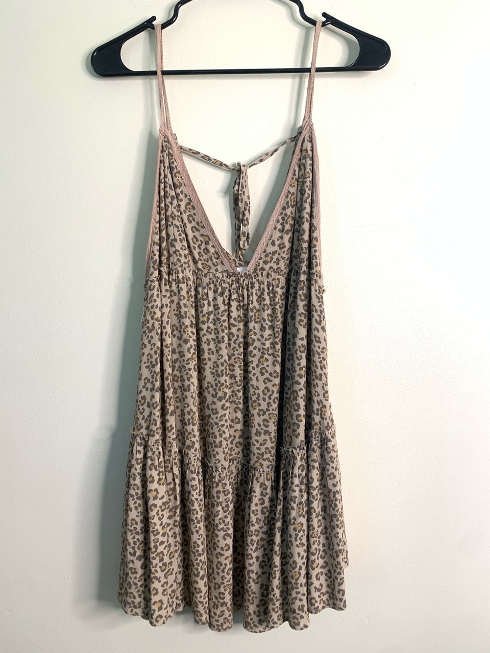 Skylar + Madison leopard print mini dress features a tiered babydoll silhouette